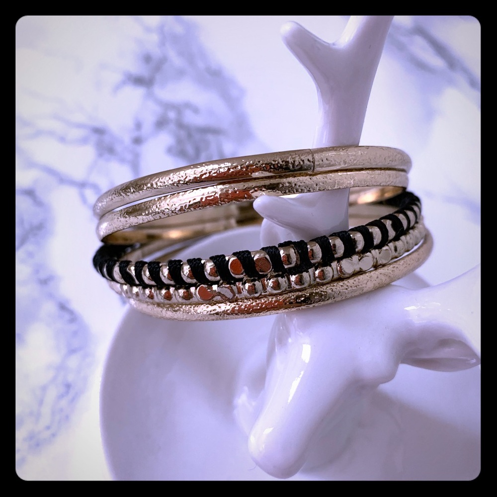 Gold and black colored bangle set